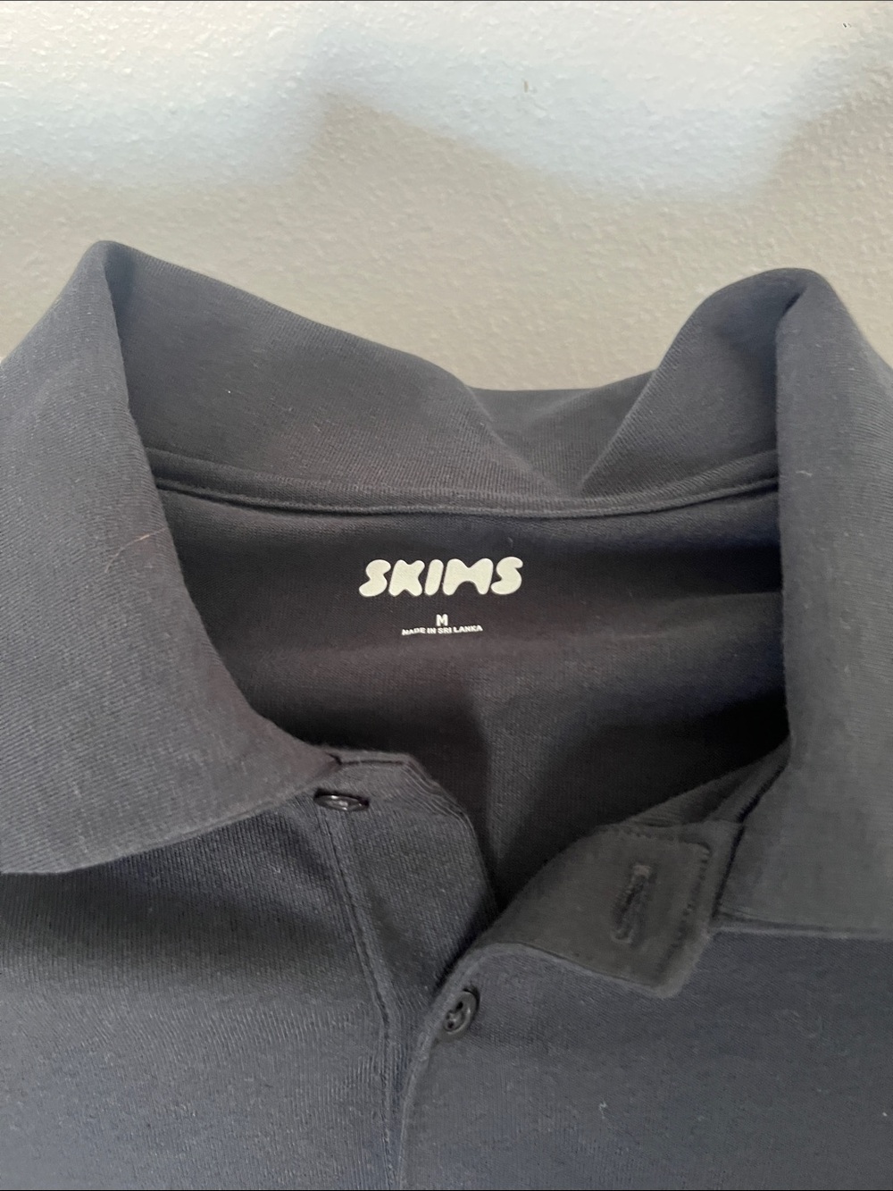 SKIMS Men's Black Polo with Three-Button Placket - Picture 2 of 3